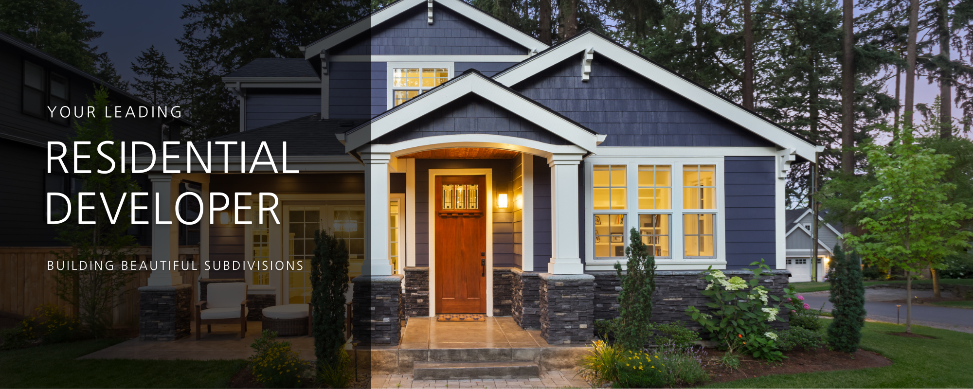 beautiful home with blue wood plank siding 